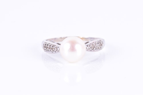 Lot 671 - An 18ct white gold, diamond, and pearl ring,...