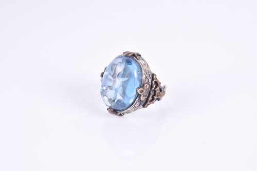 Lot 343 - An unusual silver and blue glass ring, set...