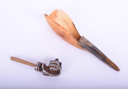 Lot 487 - A small Tibetan tobacco pipe, with white metal...