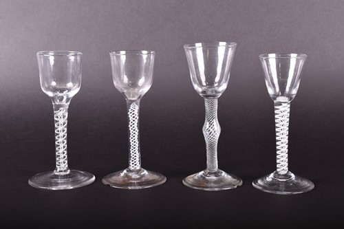 Lot 443 - An 18th century wine glass with round funnel...