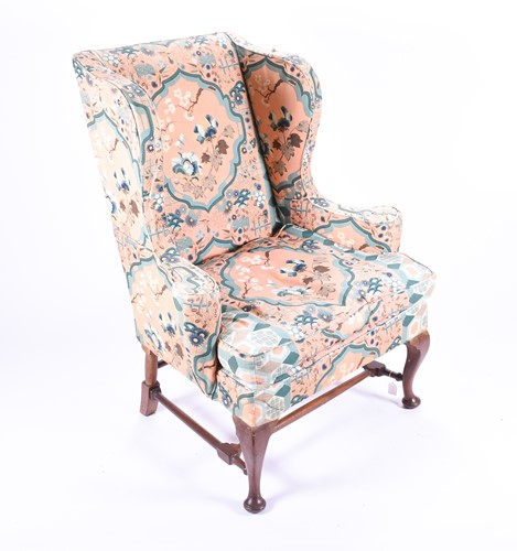 Lot 97 - A Georgian style mahogany wing armchair,...