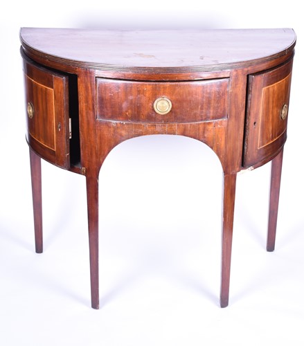 Lot 79 - A Georgian mahogany dwarf bowfront sideboard,...
