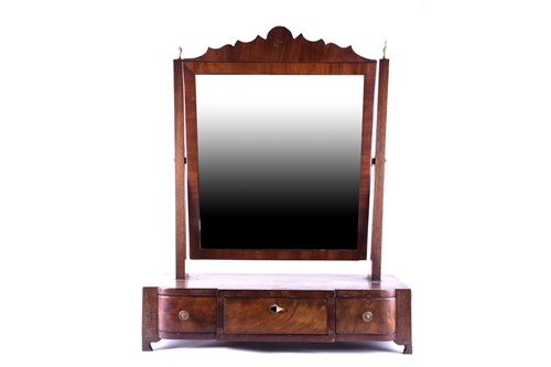 Lot 143 - A late Geo III mahogany toilet mirror, early...