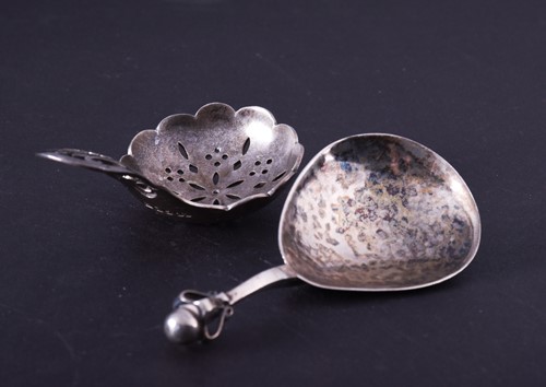 Lot 619 - An Arts & Crafts style silver caddy spoon,...