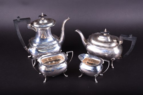 Lot 635 - A Geo V silver four piece tea and coffee set,...