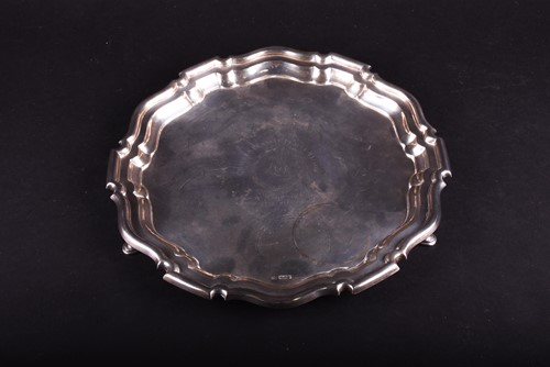 Lot 605 - An Edwardian silver salver, Mappin & Webb,...