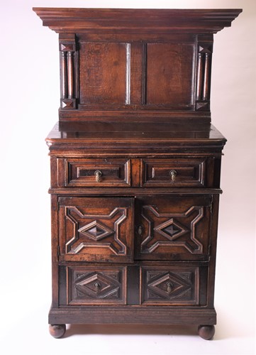 Lot 147 - An oak cupboard with blind gallery back, 17th...
