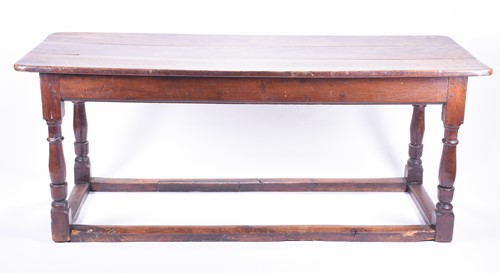 Lot 180 - A large George III oak refectory table,...