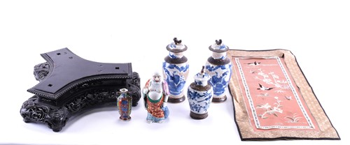 Lot 283 - A Chinese carved black wood triform stand,...
