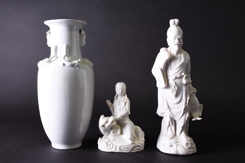 Lot 284 - A Chinese blanc de chine figure of Guanyin...