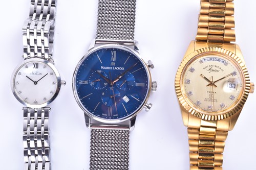 Lot 546 - A group of three wristwatches, comprising a...