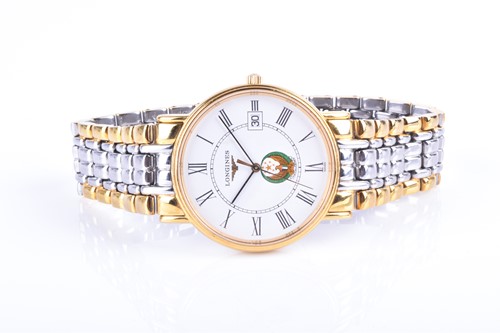Lot 574 - A Longines tone tone quartz wristwatch, the...