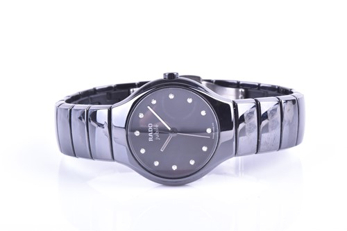 Lot 575 - A Rado Jubile Diastar ladies black polished...