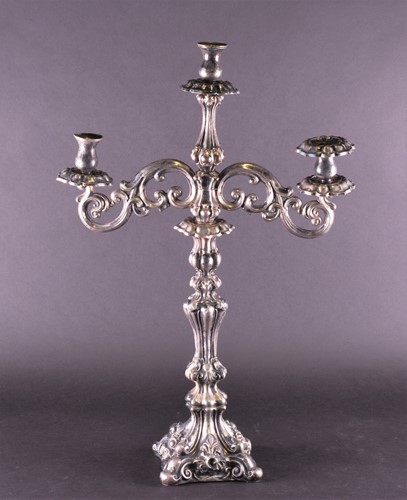 Lot 593 - A large Continental white metal twin-branch...