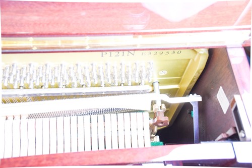 Lot 173 - A Yamaha upright piano with high gloss finish,...