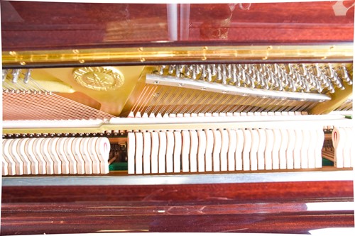 Lot 173 - A Yamaha upright piano with high gloss finish,...