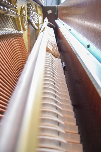 Lot 173 - A Yamaha upright piano with high gloss finish,...