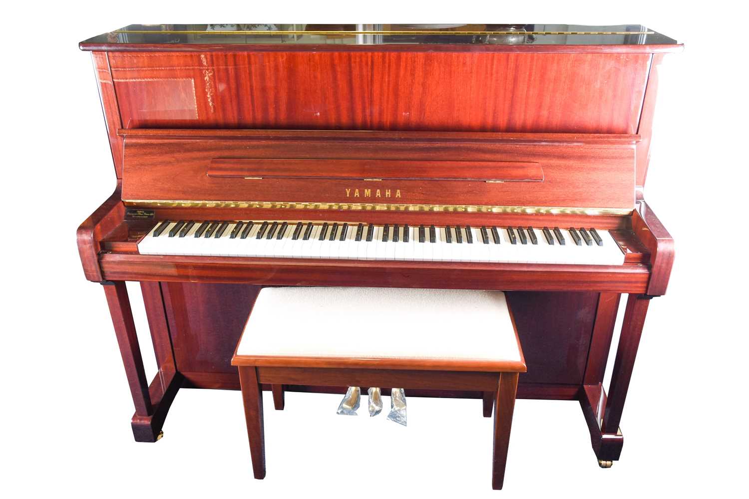 Lot 173 - A Yamaha upright piano with high gloss finish,...
