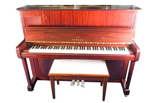 Lot 173 - A Yamaha upright piano with high gloss finish,...