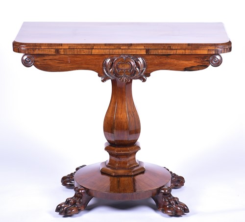 Lot 127 - A Regency rosewood foldover card table, the...