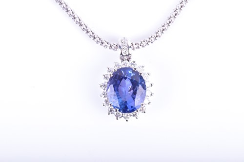 Lot 767 - An 18ct white gold, diamond, and tanzanite...