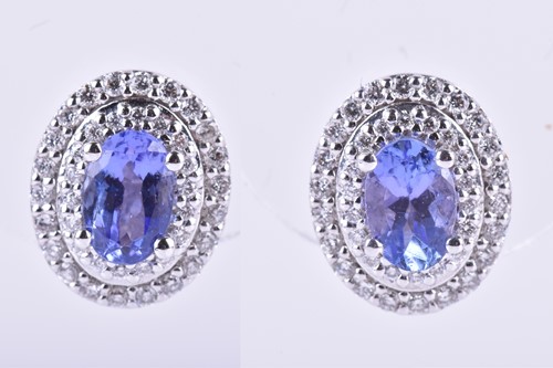 Lot 700 - A pair of 18ct white gold, diamond, and...