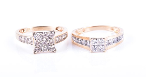 Lot 815 - A yellow metal and diamond ring set with four...