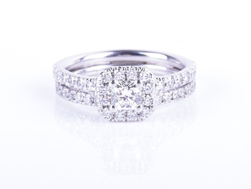 Lot 744 - A 14ct white gold and diamond ring by Hearts...