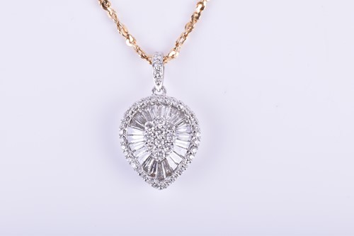 Lot 912 - An 18ct white gold and diamond pendant of pear-...