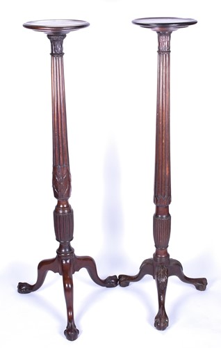 Lot 82 - A near pair of mahogany torcheres, 19th...