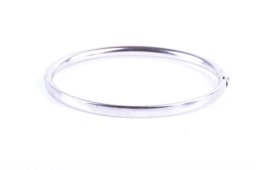 Lot 863 - Tiffany & Co. An 18ct white gold and diamond...