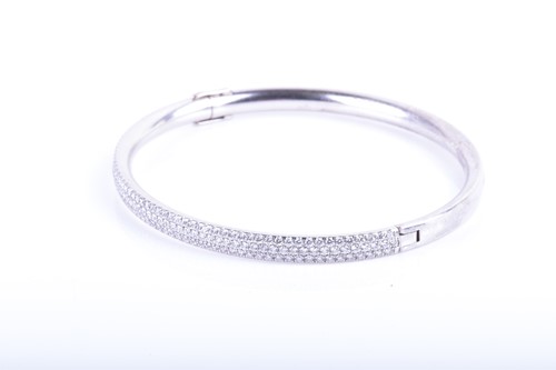 Lot 863 - Tiffany & Co. An 18ct white gold and diamond...