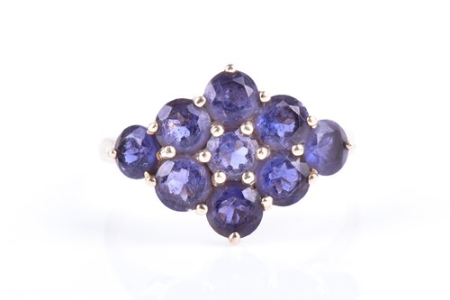 Lot 817 - A yellow metal and iolite cluster ring set...