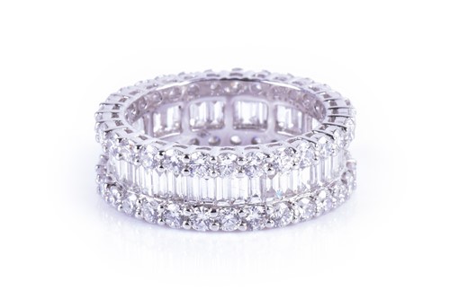 Lot 804 - A fine diamond eternity ring the central row...