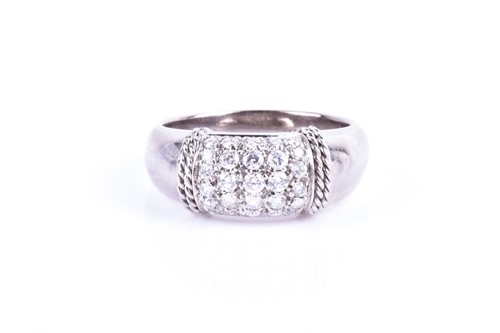 Lot 669 - An 18ct white gold and diamond ring by...