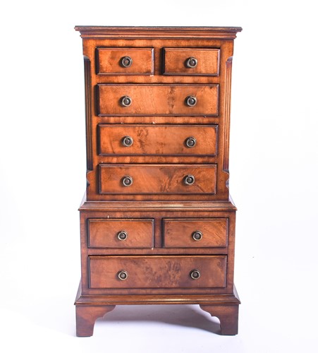Lot 108 - A small 20th century mahogany narrow chest,...