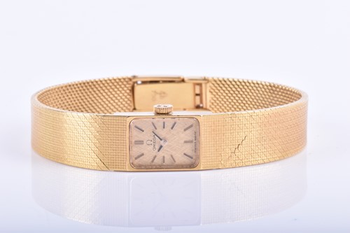 Lot 566 - An 18ct yellow gold ladies Omega cocktail...