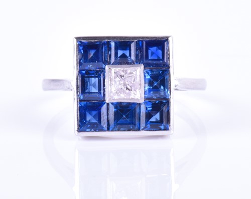 Lot 897 - A diamond and sapphire ring in the Art Deco...