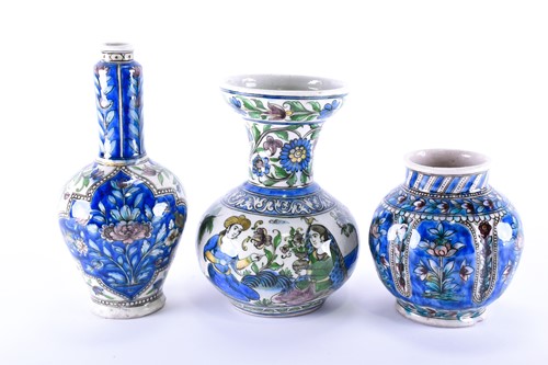 Lot 344 - Three Persian Qajar pottery vases, 19th...