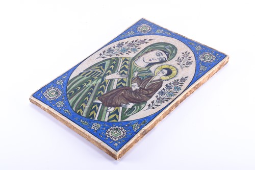 Lot 176 - A Qajar tile of the Madonna & Child, 19th...