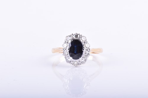 Lot 907 - An 18ct yellow gold, diamond, and sapphire...