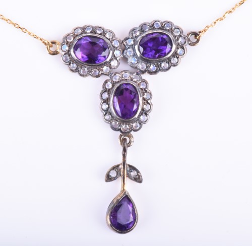 Lot 894 - A silver gilt, amethyst, and moonstone drop...