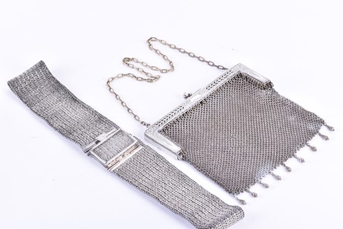 Lot 617 - A white metal mesh link ladies belt the mesh...