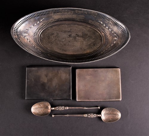 Lot 443 - An Edwardian oval silver basket, two cigarette...