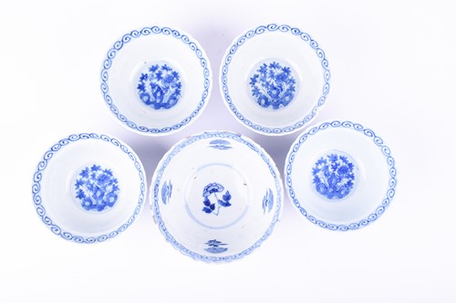 Lot 148 - A Kangxi petal moulded blue and white bowl,...
