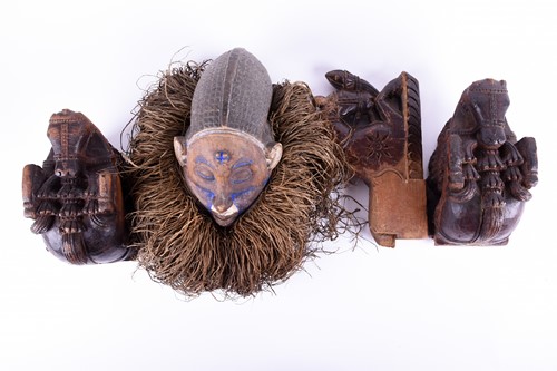 Lot 215 - An African tribal head mask with painted face...