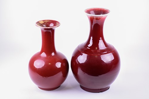 Lot 234 - Two 20th century Chinese sang de boeuf vases,...