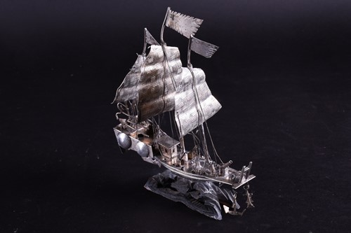 Lot 114 - A Chinese silver metal armed junk, circa 1900,...
