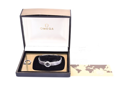 Lot 405 - An Omega ladies 18ct white gold and diamond...
