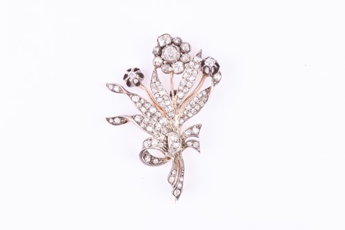 Lot 682 - A Victorian diamond floral spray brooch set...